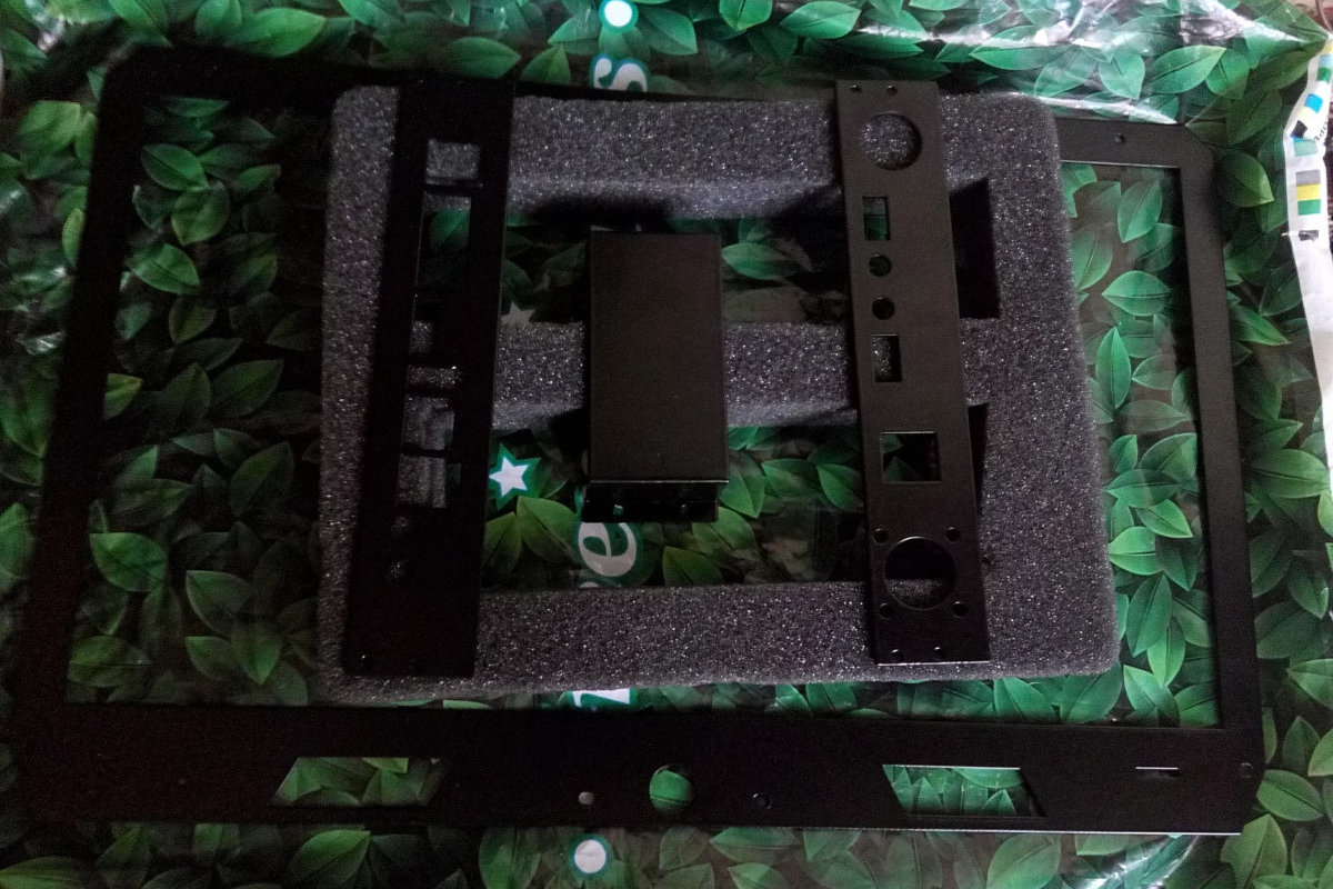 Enclosure components after powder coating. Enclosure components after powder coating.